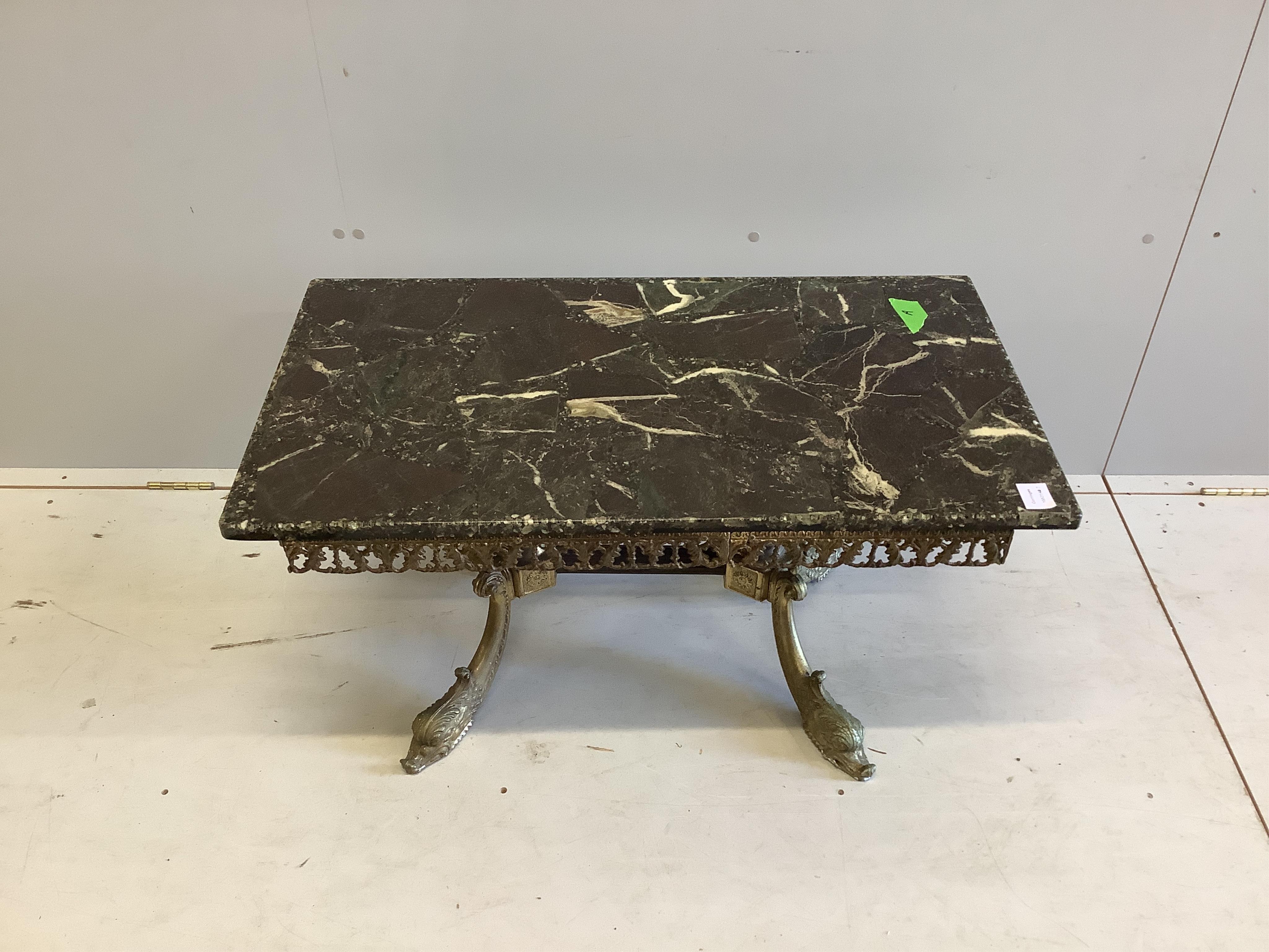 A rectangular faux marble and gilt metal rectangular coffee table on scroll dolphin feet, width 89cm, depth 50cm, height 46cm. Condition - good